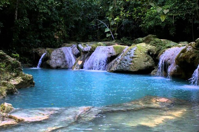Blue Hole Secret Falls and River Tubing Private Tour - Cool Blue Hole: mineral water, Tarzan ropes, and choice
