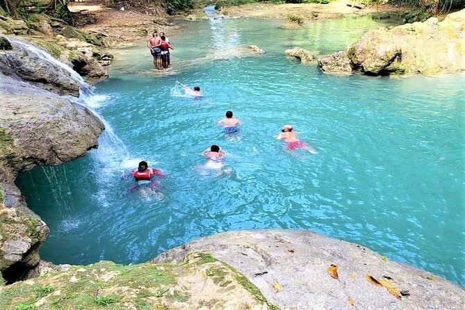 Blue Hole & Secret Falls Day-Trip with Shopping from Grand Palladium - From Grand Palladium to Ocho Rios: the coach ride that sets the tone
