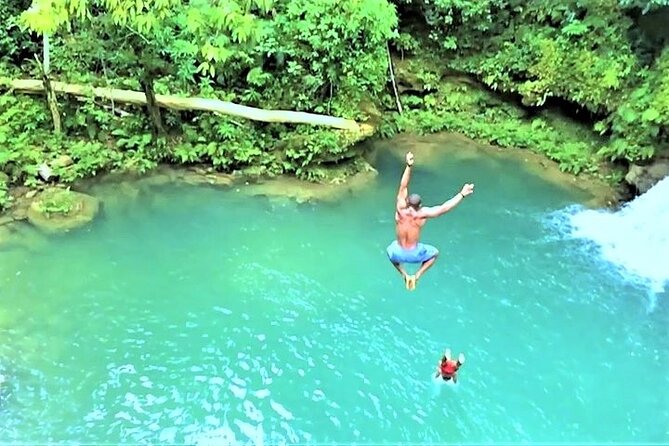 Blue Hole & Secret Falls Day-Trip with Shopping from Grand Palladium - Cool Blue Hole: mineral pool fun with jumps, rope swings, and cave swimming