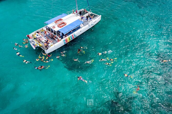 Catamaran Party Cruise and Snorkeling from Montego Bay - Snorkeling Near Doctor’s Cave Beach: Calm-Water Reef Time