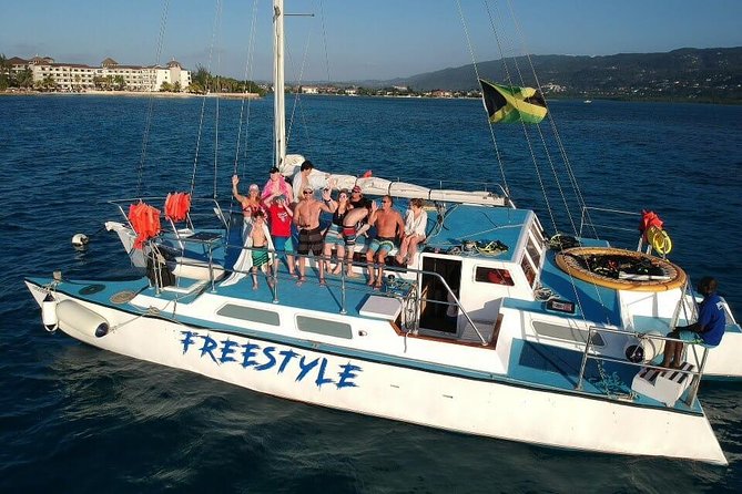 Catamaran, snorkeling & Dunn's River Falls - The catamaran cruise setup: drinks, views, and a day that moves