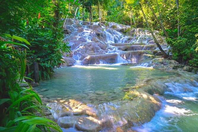 Dunn's River Falls , Bamboo Rafting & ATV Ride from Montego Bay - Dunn’s River Falls climb: why the 600-foot route feels like a ride