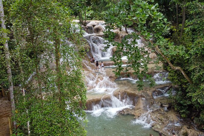 Dunns River Falls, Rafting, Zipline & Horseback from Montego Bay - Rio Bueno and Rio Nuevo: Short Stops That Add Context