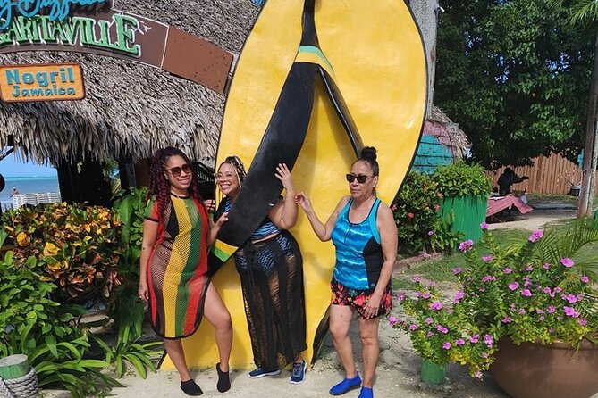 Experience Negril Seven Mile Beach & Jamaica's Famous Ricks Café - Rick’s Cafe at sunset: reggae, cocktails, and cliff jumping