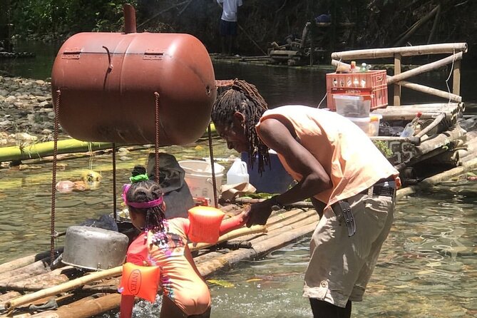 Great River Bamboo Rafting and Limestone Full Body Massage Tour From Montego Bay - Swimming, rain, and the weather reality in Jamaica