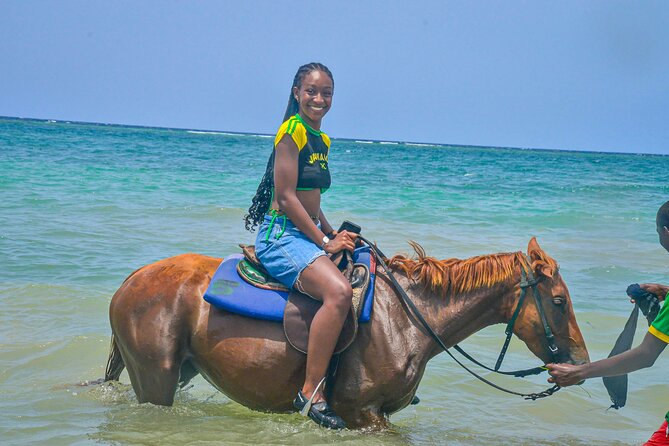 Horseback riding & bluehole secret falls from Montego Bay - Dunns River Falls Time: The Slippery Climb and Garden Atmosphere