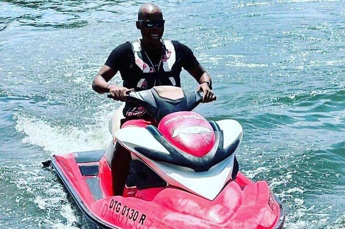 Jet Ski/ Parasailig Water Activity in Montego Bay Jamaica. - Jet Ski Speed Meets Montego Bay Water