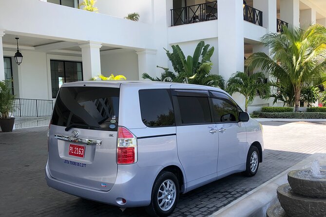 Montego Bay Airport Transfers ( Round Trip-Montego Bay Hotels) - The ride itself: AC comfort, luggage help, and Jamaica stories