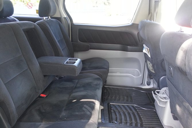 Negril Hotels Private Transfer - What the airport pickup feels like: sign, waiting spot, and flight details
