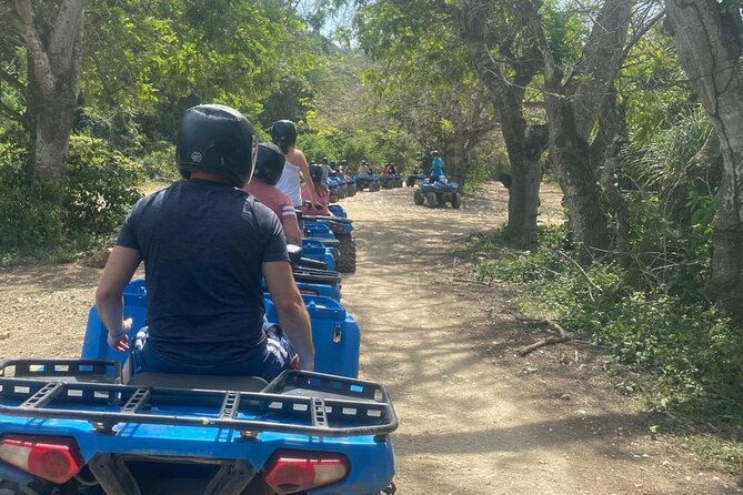 Negril Private Day Tour: ATV Ride, Party Catamaran & Ricks Cafe - Rick’s Cafe sunset stop: live music, cliff-jump style fun, and good timing