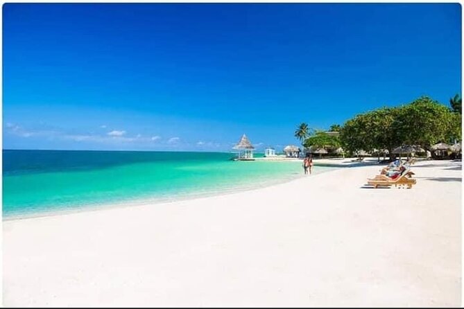 Negril Seven Miles Beach, Snorkeling, Boat Ride, Ricks Cafe Combo - Guides Travis and Lisa, plus Captain Andy on the water