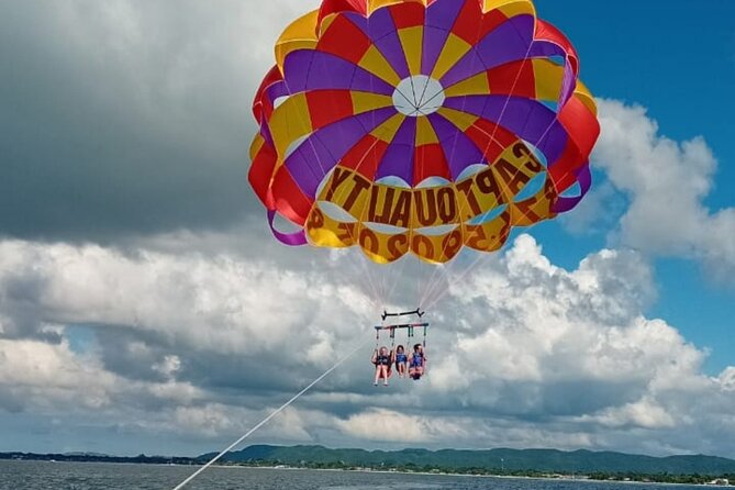 Negrils Seven Miles Beach, Rick's cafe and Parasailing Tour. - From Montego Bay to Negril: a comfort-first drive