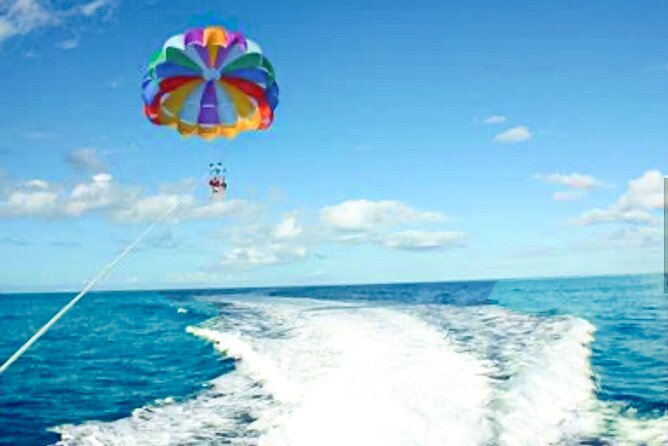 Parasailing above Turquoise Ocean Waters in Montego Bay - After You Land: Beach Time That Actually Connects to the Views