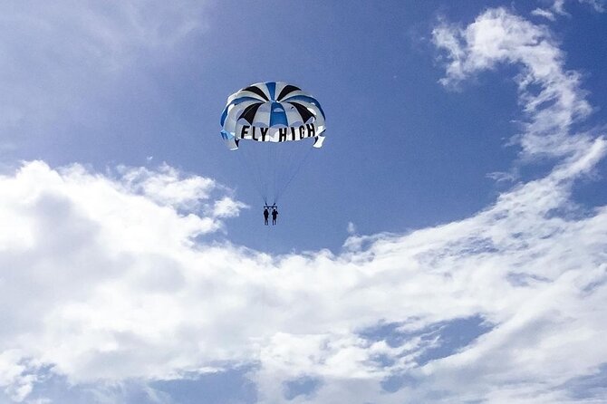 Parasailing, Blue Hole Mineral Spring, Seven Mile Beach - Seven Mile Beach: swimming, snorkeling, and that postcard feeling