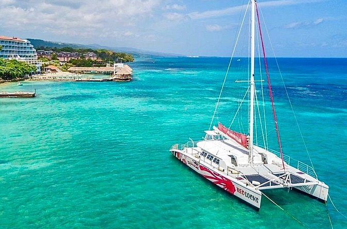 Party Catamaran Cruise with Open Bar and Snorkeling Montego Bay - Snorkeling by a nearby reef: the calm break in the party