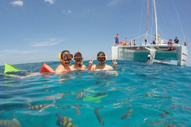 Party Catamaran Cruise with Open Bar and Snorkeling Montego Bay - Your ride to the dock: private transport, shared catamaran