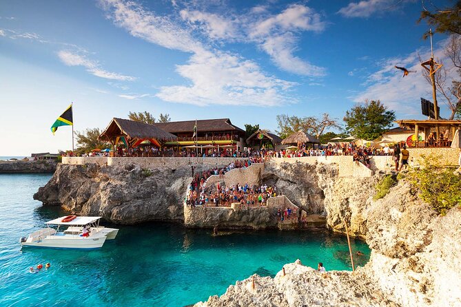 Private Trip to Blue Hole Mineral Springs, Negril & Ricks Café - Rick’s Cafe Sunset: Reggae, Cliff Jumpers, and the View That Runs the Show