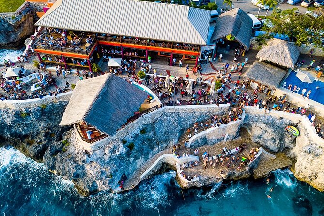 Rick s Café and Seven Mile Beach Private Tour Negril Jamaica - Seven Mile Beach for two hours: sun, swim, and beach-bar time