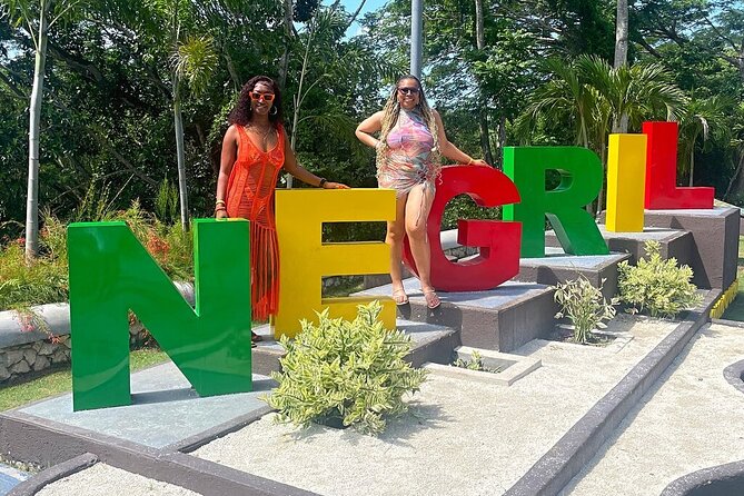 Ricks Cafe and Negril Seven Miles Beach Irie Tour - From Montego Bay to Negril: an AC ride with room for quick stops