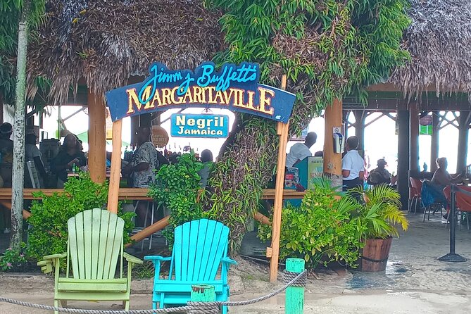 Seven Miles Beach in Negril and Ricks Cafe from Montego Bay - Shade, umbrellas, and crowd reality on Seven Mile Beach